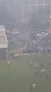VIDEO: Thick smoke billowing from a Tampines flat which caught fire this afternoon, clouding the view two blocks away. (Video: Pooja Shukla) | CNA