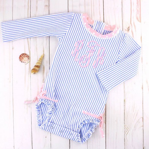 OMG OMG! It's BACK!! 🥳 This one sells out FAST so GO GO GO! 🏃‍♀️ "These swimsuits are worth every penny! Great quality and love the snap bottoms for easy diaper changes!" -Brittany N. "This is my absolute favorite, it’s so simple and sweet. The matching hat is a must!" -Kayla C. | RuffleButts