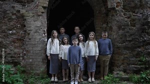 Group Portrait of Children in Historic Archway. Concept of learning history.