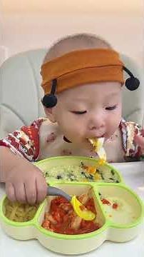 15-month-old baby immersed in eating is very comforting