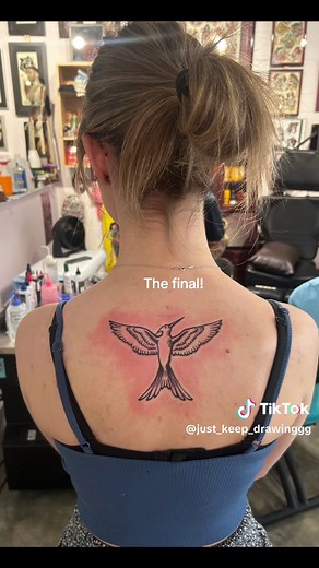 Incredible Hunger Games Mockingjay Tattoo Design