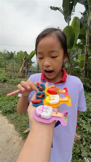 The kind little girl ate rainbow candy and drank cocacola very well. #funny #candy #food #cute