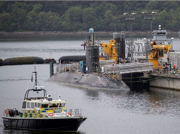 Iranian and Romanian charged after trying to enter UK’s nuclear submarine base