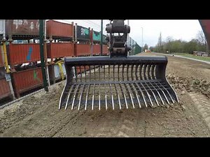 Takeuchi tb125 and landscape rake
