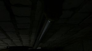 Lamp on in a dark room - Free Stock Video