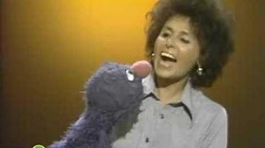 Sesame Street Lena Teaches Grover To Say "How Do You Do?"