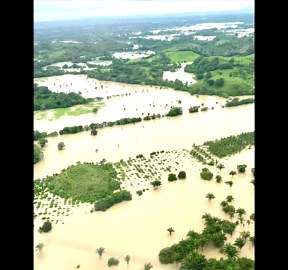 Still photos of aerial views showing eastern Mexico inundated by floods