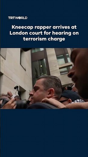 Kneecap rapper arrives at London court for hearing on terrorism charge