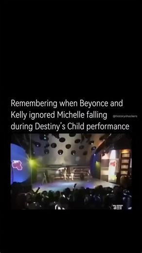 History Shockers on Instagram: "In 2001, during a Destiny’s Child performance at the 2001 Soul Train Music Awards, Michelle Williams tripped and fell flat on the stage floor as the trio walked out to perform “Survivor.” Beyoncé and Kelly Rowland continued strutting forward without pausing or looking back, their side-eye glances captured in a viral clip that fueled memes and speculation about group dynamics. Michelle later clarified it was an accidental slip on a slick stage, and no one ignored h