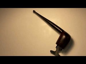 How to use a reamer for cleaning the carbon layer in the smoking pipe?