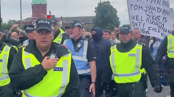 Scuffles break out between police and anti-immigration protesters in Middlesbrough