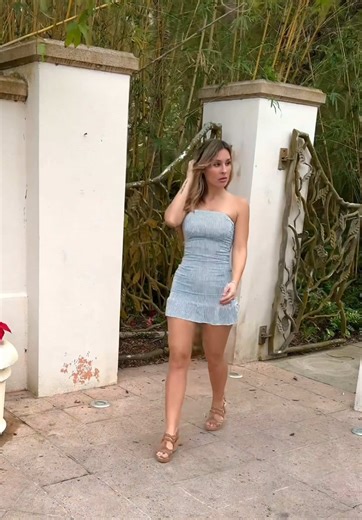 Gotta know #trendingrae #minidressstyle #confidentwalk #outfitinspo #chicvibes Trending Rae A confident outdoor walk in a strapless striped mini dress styled with neutral wedges. The setting feels garden-chic and upscale, highlighting effortless elegance