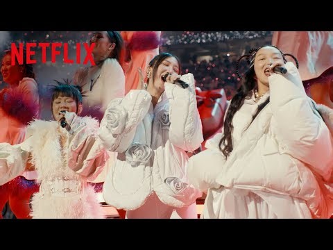 EJAE, AUDREY NUNA, and REI AMI perform during Snoop’s Holiday Halftime Party | Netflix