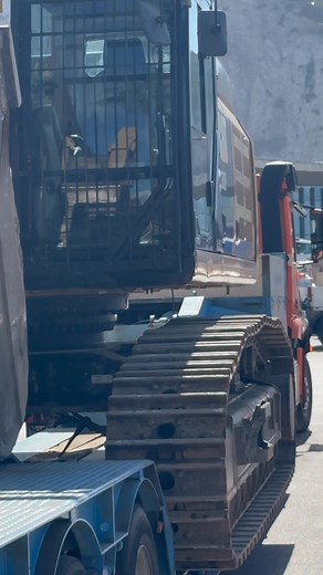 THE SPAIN GIBRALTAR border as @caterpillarinc is loaded down to cross. At the THE SPAIN GIBRALTAR the truckers have a separate entrance to pass through customs and border police checks. #caterpilar #cat #border #spain #gibraltar #trucker | The Spain Gibraltar Channel