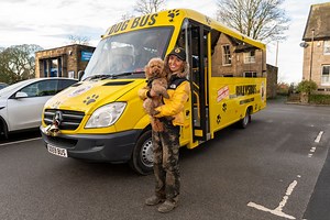 Britain's first doggy day care service using a bus is now open