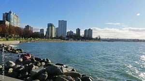 Vancouver Canada Time-Lapse at Stanley Park Canada British Columbia with water and buildings shot in 4k high resolution