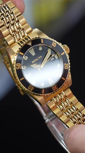 𝗚𝗼 𝗳𝗼𝗿 𝗚𝗼𝗹𝗱 𝘄𝗶𝘁𝗵 𝘁𝗵𝗲 𝗜𝗻𝘃𝗶𝗰𝘁𝗮 𝗣𝗿𝗼 𝗗𝗶𝘃𝗲𝗿 𝟯𝟵𝟳𝟱𝟴 ✨ Built to impress, the Invicta Pro Diver 39758 blends deep-sea heritage with bold golden flair. Featuring a striking gold-tone stainless steel case and bracelet, paired with a powerful black dial, this 44mm automatic timepiece is made for those who live life on their own terms. No batteries needed — its self-winding movement keeps ticking with your every move. Whether you're diving deep or dressing sharp, this gold