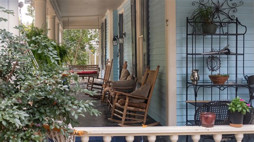 Turn affordable Dollar Tree items into an outdoor table that looks so chic on the porch
