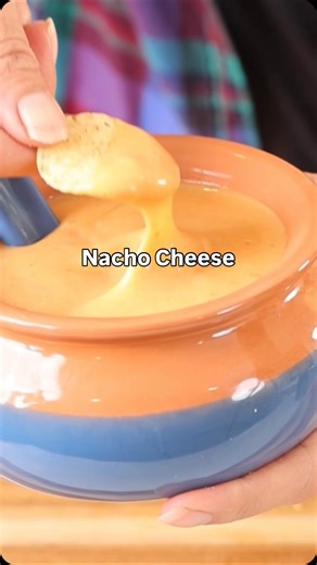Can you believe this Nacho Cheese Sauce is made from carrots and potatoes? 🥕🥔 The recipe comes from my book, Plant-Based on a Budget, and delivers incredibly creamy dairy-free nacho cheese that’s perfect to add to tacos, burritos, nachos, mac and cheese, and more. How would you enjoy this nacho cheese? Let me know if you want the recipe! 💛 #recipes #nachocheese #dairyfree #budgetfriendlyrecipes #plantbased | Plant-Based on a Budget
