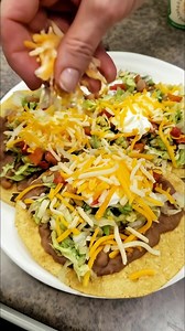 "Taco Bell Tostada ""My husbands 92-year-old grandma said it was the best version of it she had ever tried. Followed the recipe exactly and Ill do the same next time I make it... which will be soon!"" Must express something to keep getting my recipes.... Thank you. Recipe in First c.o.m.m.e.n.t ." | Best Mexican Recipes