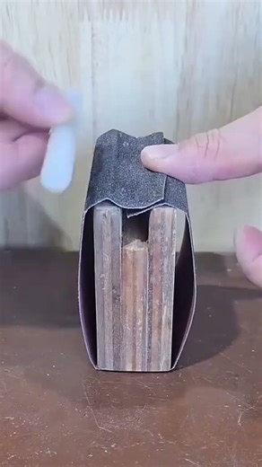 Easy way to attach sandpaper to a wood block for a tighter grip when sanding