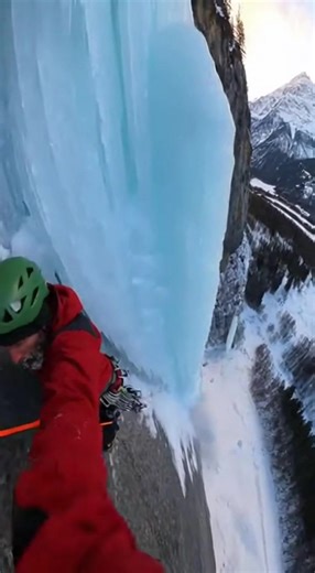 The moment a ton of frozen waterfall collapses like breaking glass! 🧊💥 #icefall #winter #dangerous #dramatic #frozenwaterfall #collapse #winter #danger | Vid Factory