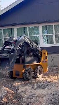 CFG krw232 Chinese wheeled skid steer loader grading recycled road base after pilot spring install