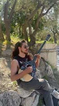 Throat-Singing near the Odeon of Herodes Atticus #bouzouki #streetmusic #mongolianmusic