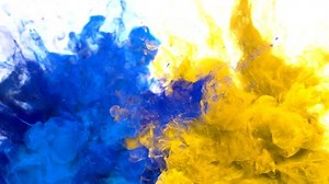 Blue Yellow Color Burst - Multiple colorful smoke powder explosion fluid ink particles slow motion alpha matte isolated on white