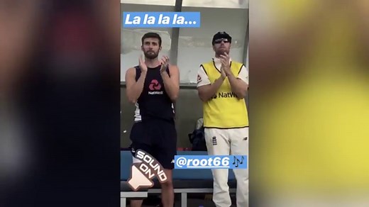 England players applaud Joe Root after he gets a century