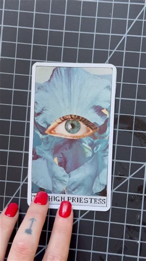 Stephanie Gilbert on Instagram: "The 3rd card in my collage art tarot deck is The High Priestess. 👁️ She represents the divine feminine, sacred knowledge & the unconscious mind. To be still & tune into your intuition. The blue iris symbolizes faith & deep trust and I also chose this to visually represents the divine feminine. The eye represents our third eye, a symbol of inner knowing & intuition. I scored a lot of vintage flower grower magazines recently so expect a lot of nature / floral imag