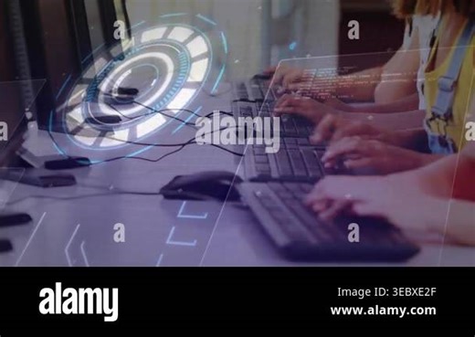 Students typing at keyboards in lab, activating holo UI over keyboards with code panels for coding. Holographic, interface, programming, collaboration, circuitry, monitors, desks Stock Video Footage - Alamy