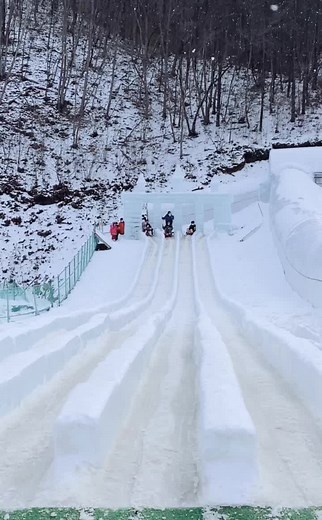 Enjoying a Fun Day Sledding in the Snow
