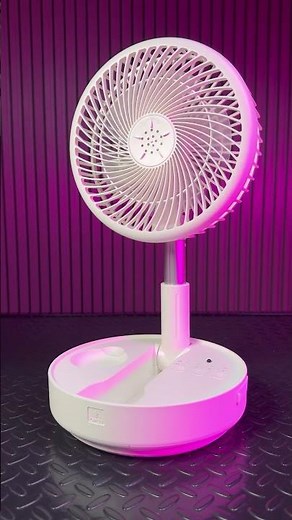 The ultimate fan: It's wireless and charges your phone! 🔋🌬️