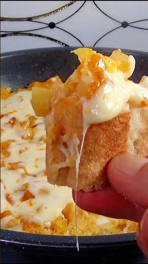 Pan-Fried Potatoes with Cheese, Onions, and Eggs Recipe