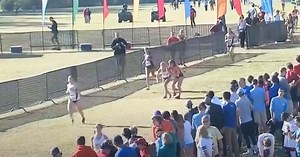 Collapsed Runner Carried By Competitors Over Finish Line In Heartwarming Display Of Sportsmanship