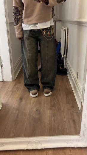 Mirror Selfie Fashion in a Stylish Hallway