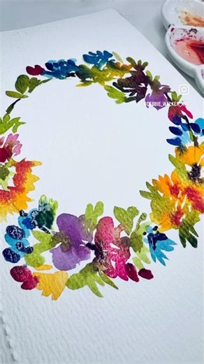 Painting a bright, cheery floral wreath — bringing a little color and happiness to December.