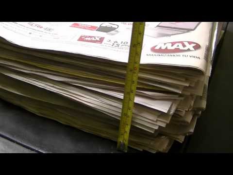 Calcular el peso de papel con un metro para reciclar