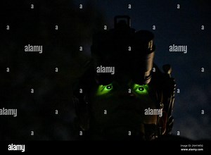 A U.S Air Force Senior Airman Miguel Ramirez, 628th Civil Engineer Squadron explosive ordnance disposal technician, conducts an IED sweep during Exercise Green Goblin at Joint Base Charleston, South Carolina, Dec. 7, 2022. The EOD Airmen aided the 1st Combat Camera Squadron in the four-day exercise which provides relevant and essential night-vision training to prepare combat camera Airmen with enhanced photographic and video capabilities required to capture imagery in low-light and no-light envi