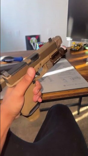 Glock 19x MOS PMM Comp & threaded barrel, SLR Magwell, ghost inc +6 mag extension, and Olight combo.