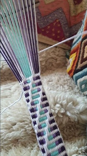 Weaving a belt with warp floats on a backstrap loom