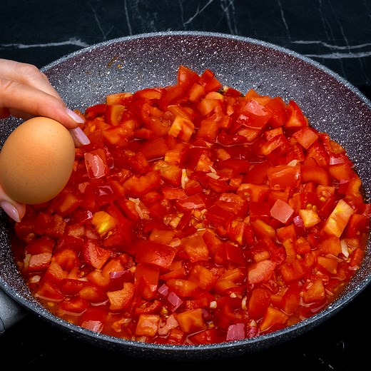 A new way to cook eggs for breakfast! The simplest and tastiest recipe, ready in 5 min! Ingredients: tomatoes - 3 pieces olive oil - 20 ml (0.7 fl oz) garlic - 3 cloves red pepper - 1 pieces sugar - 5 g (0.18 oz) salt - 7 g (0.25 oz) black pepper - 3 g (0.11 oz) hard cheese - 120 g (4.23 oz) eggs - 5 pieces salt - 3 g (0.11 oz) hard cheese - 30 g (1 oz) OVER LOW FIRE 7 minutes dill - 5 g (0.18 oz) soft butter - 50 g (1.76 oz) garlic - 4 cloves coriander - 5 g (0.18 oz) black pepper - 3 g (0.11 o