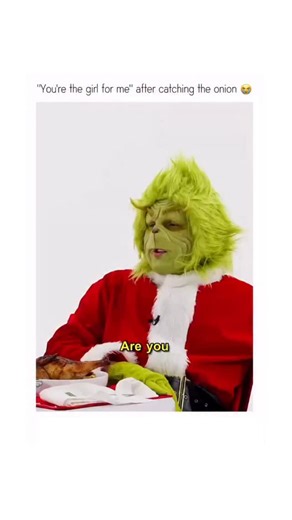 BINGEJOB on Instagram: "The video features a humorous and lighthearted interaction between a woman and someone dressed as the Grinch. The woman’s playful banter and the Grinch’s exaggerated expressions create a charming and entertaining scene. The setting, with its festive decorations and casual atmosphere, adds to the overall charm of the video. The woman’s confidence and sense of humor shine through as she engages with the Grinch, making for a truly memorable moment. The chemistry between the 
