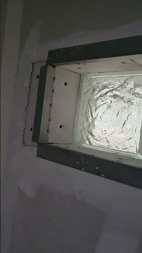 Glass Block window in the bathroom using 1/4" drywall around the sill.