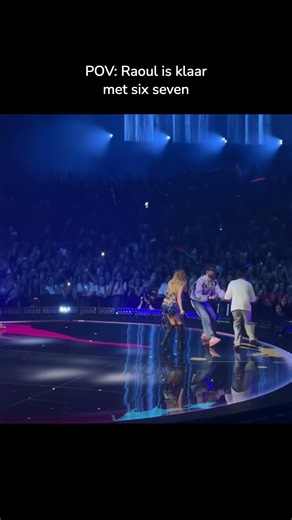 Raoul jumps and dances during performance on big stage