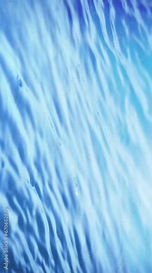 Slow Motion Water drop splash into calm water - shot with ultra high speed camera.- vertical video for your reel