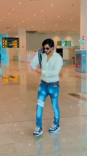 Person Walking Through Airport Terminal