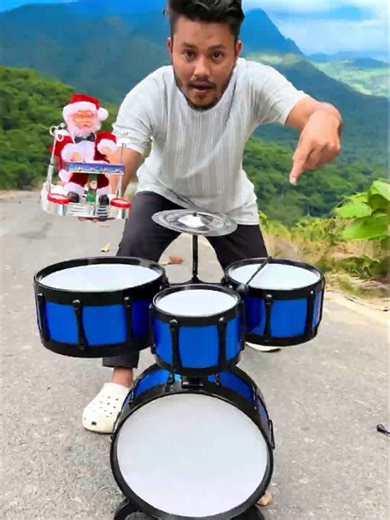 Comparing Medium Blue Drum Set and Small Santa Drum