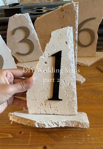 DIY stone table numbers!! #2026bride #2026wedding #diybride #tablenumbers